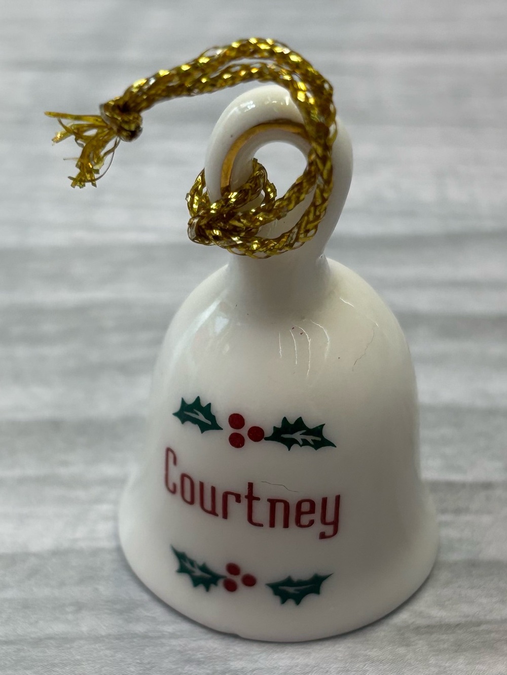 Teeny Personalized Courtney Holiday Bell Ornament in White with Gold Cord